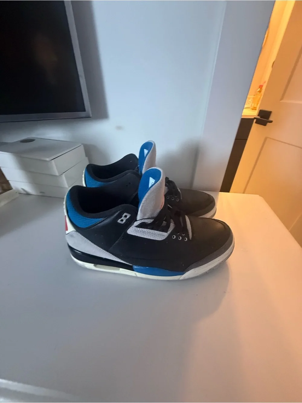 Jordan Retro Black and White Men’s Sneakers with Blue Accent